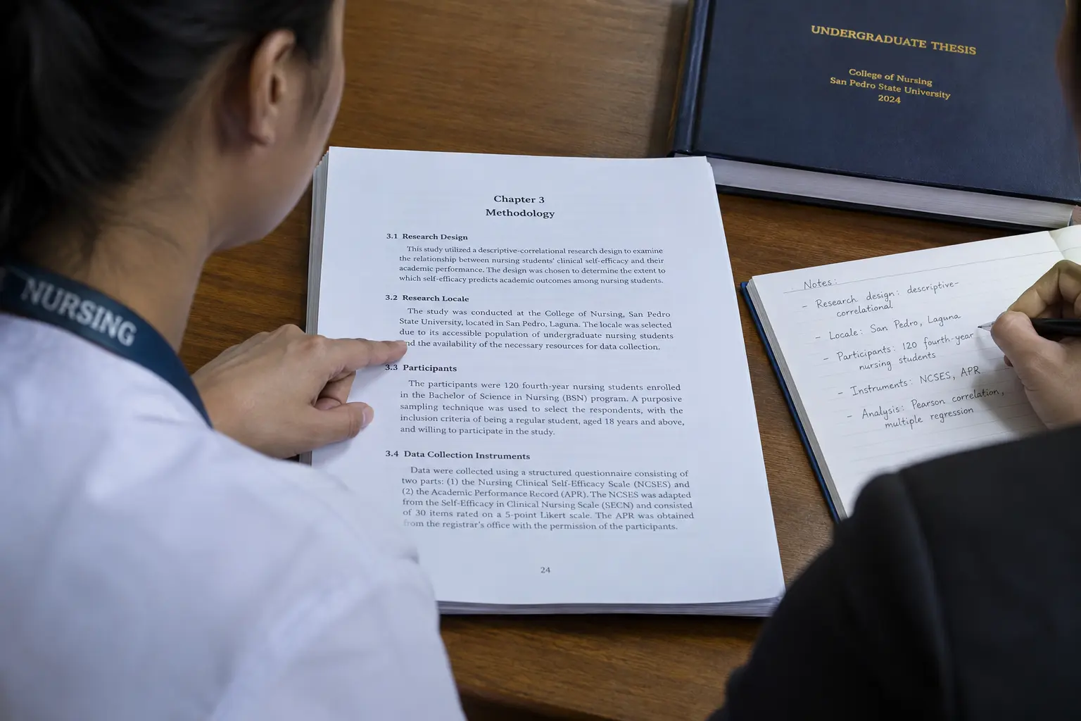 A nursing student explaining a Chapter 3 methodology page to a thesis panel examiner taking notes