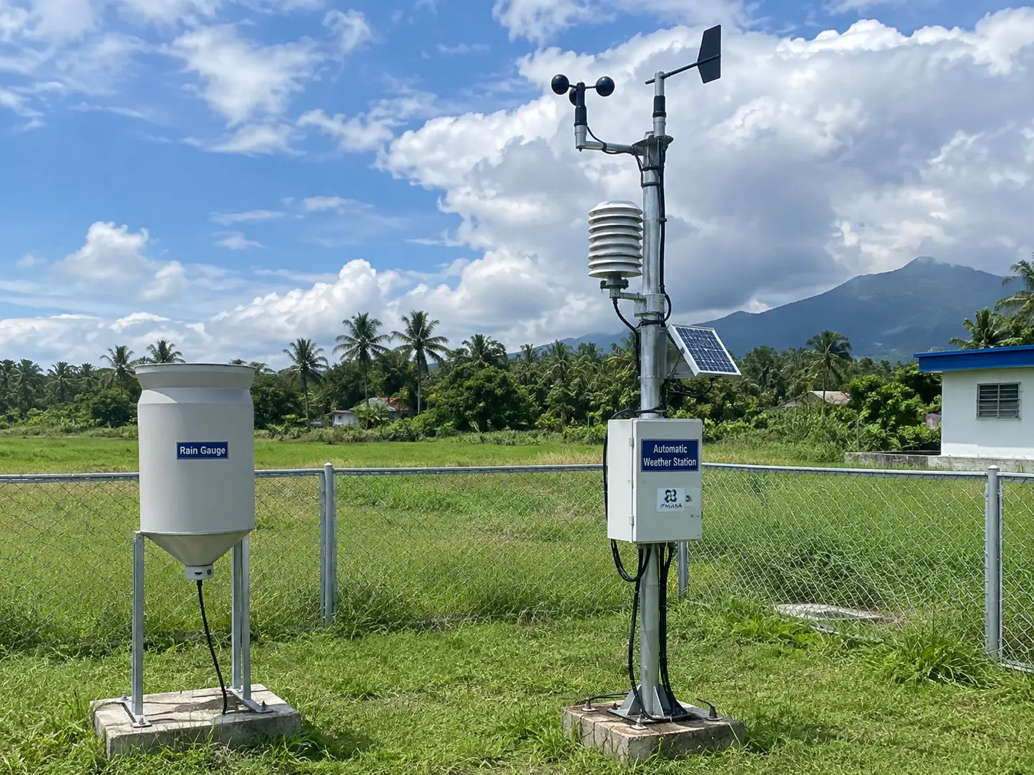 An automatic weather station with a rain gauge used for rainfall data collection in the Philippines