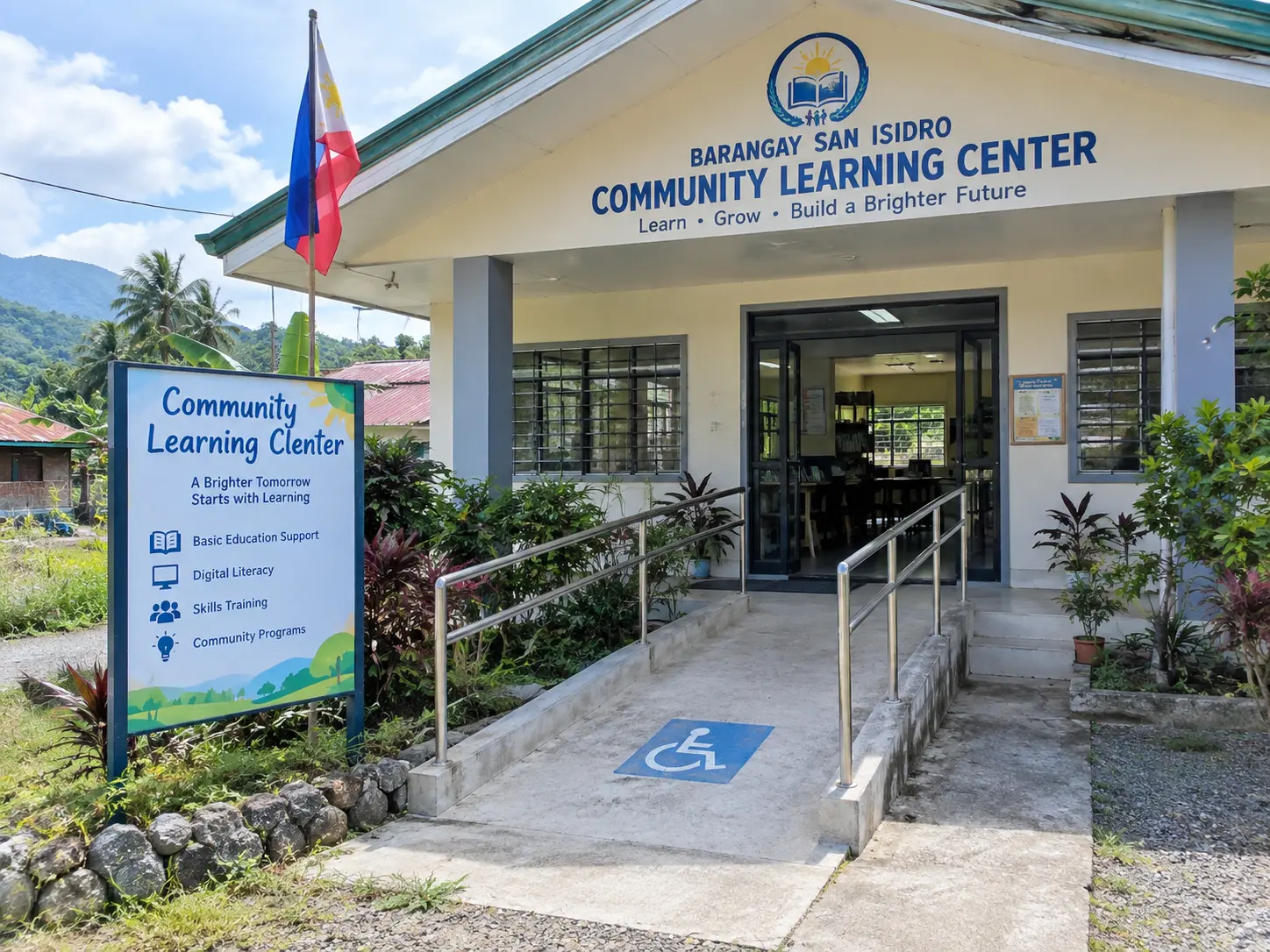 The exterior of a small community learning resource center with an accessible ramp entrance