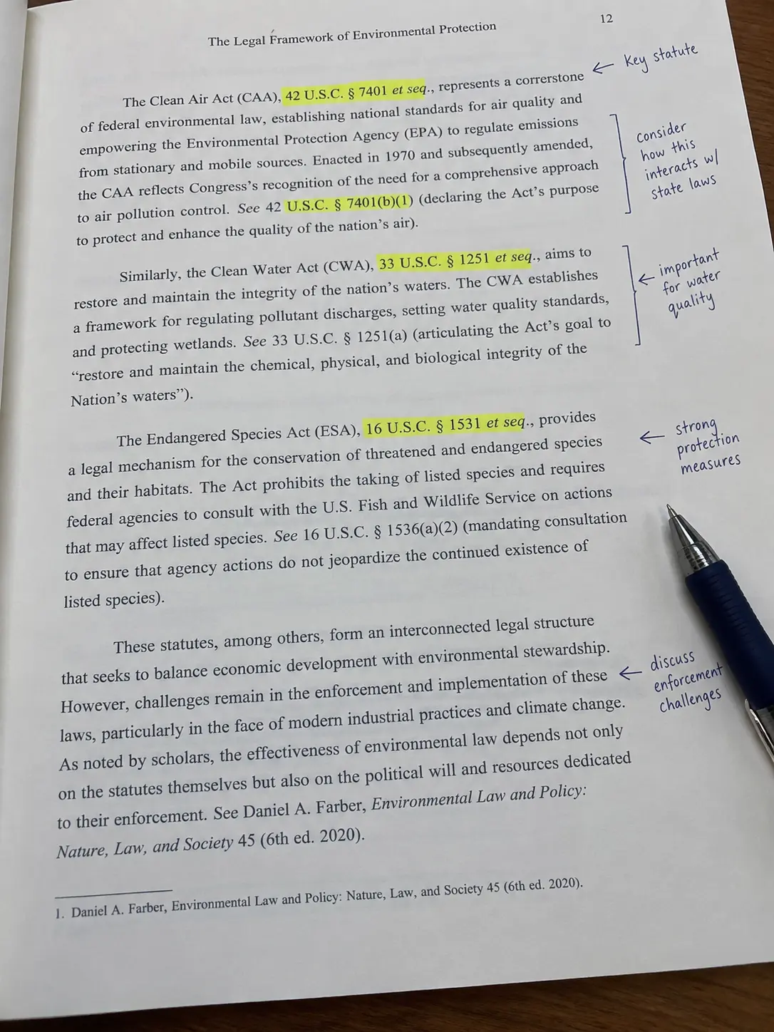 A close-up of a Legal Management thesis page with statute citations highlighted and annotated in the margin
